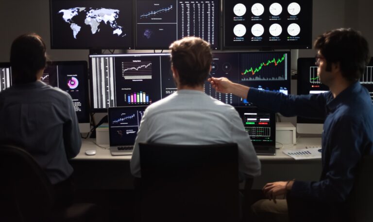 Team of financial analysts working in the office.