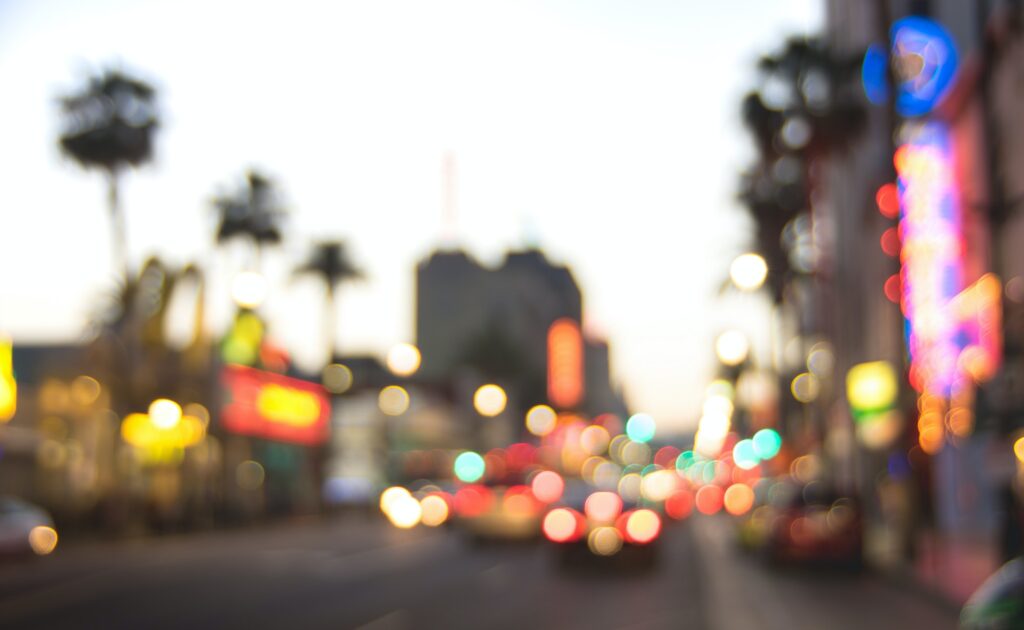 Blurred defocused background of Hollywood Boulevard after sunset