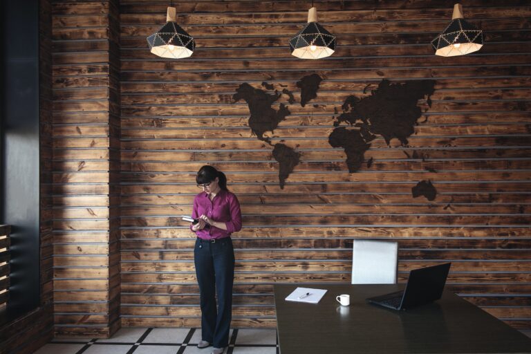 Businesswoman checking a handheld journal