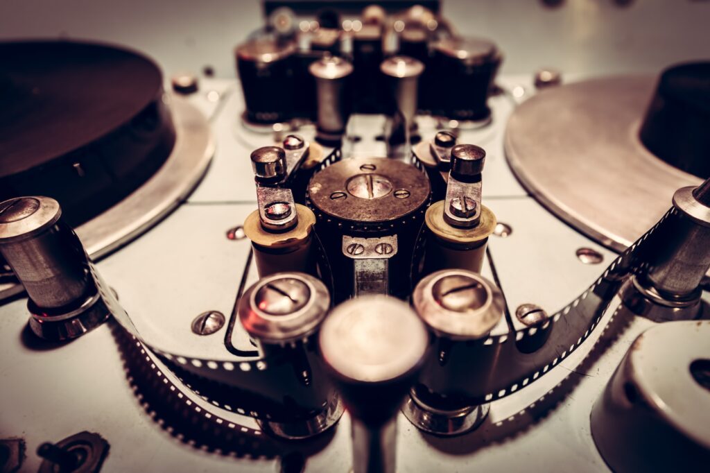 Metal parts of an old cinematographic machinery.