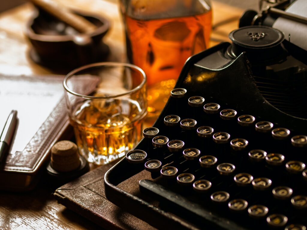 Writer's night with a glass of whiskey