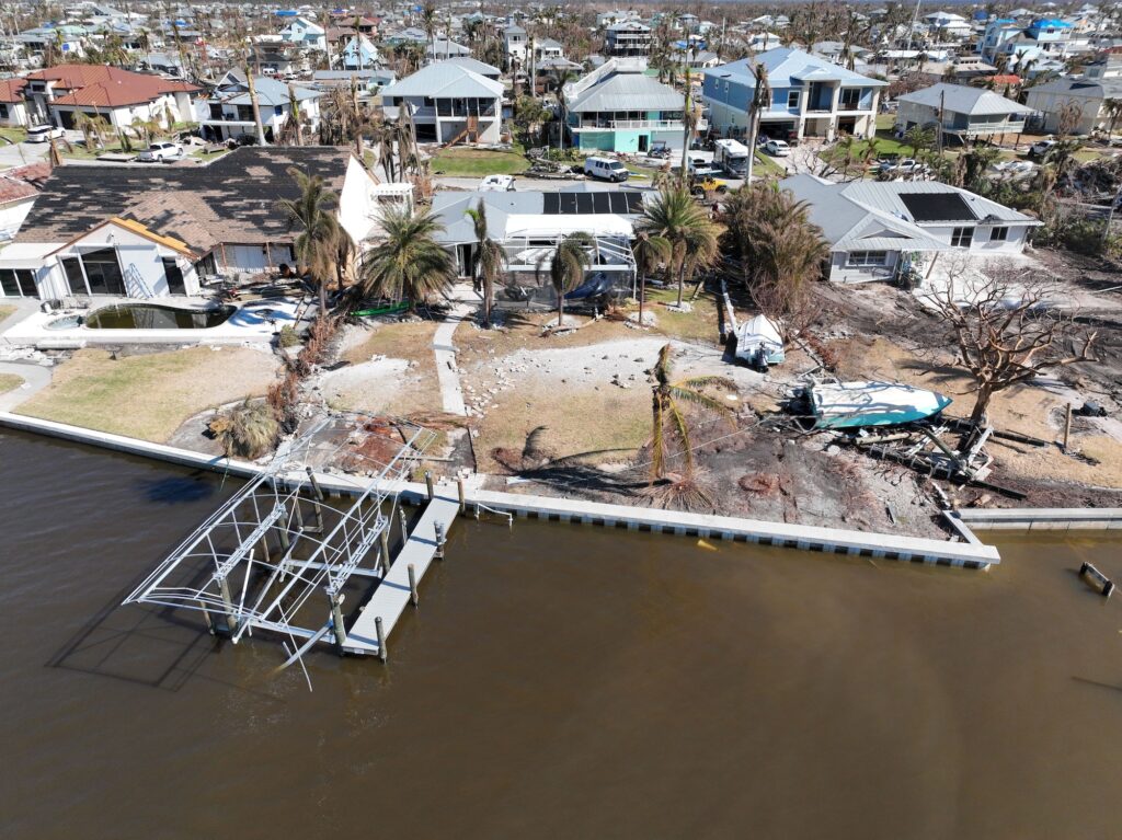 Aerial of the aftermath of the destructive Hurricane Ian in a coastal residential area, Florida