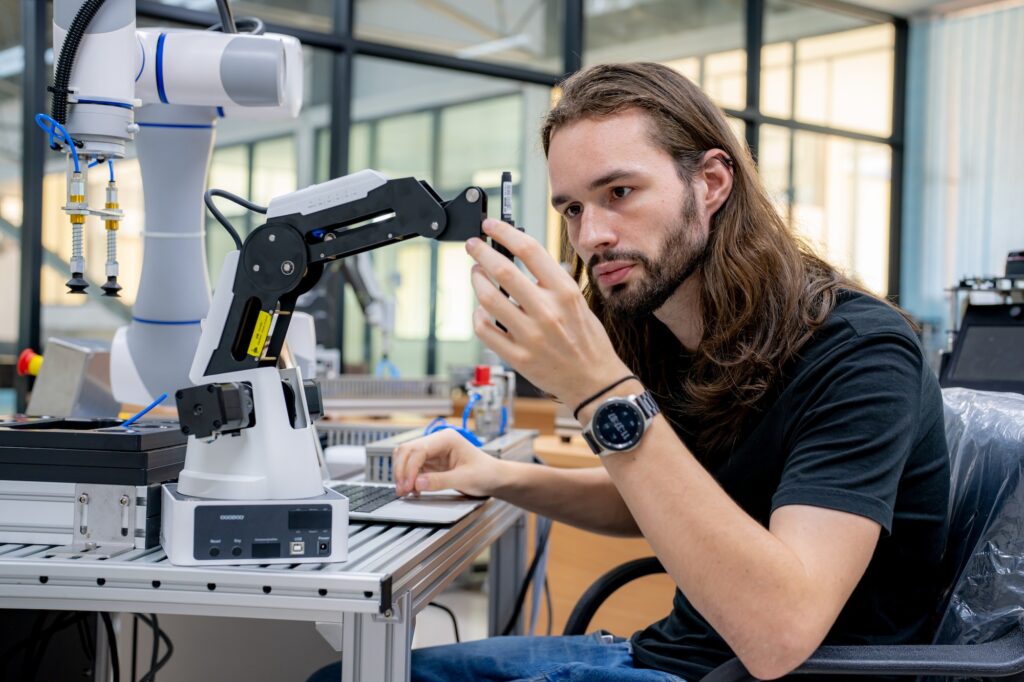 High Tech Robotic Arm with an Artificial Intelligence Computer Processor Unit in its