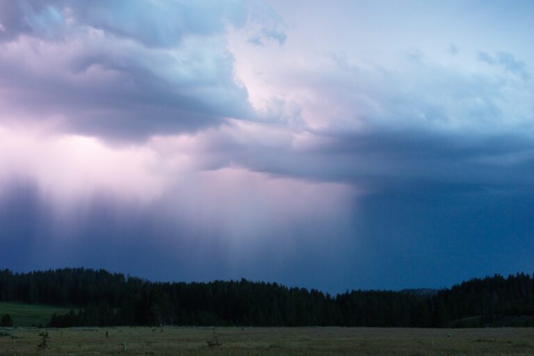 Monsoon Rains Fall From Storm Clouds Generating Lightning