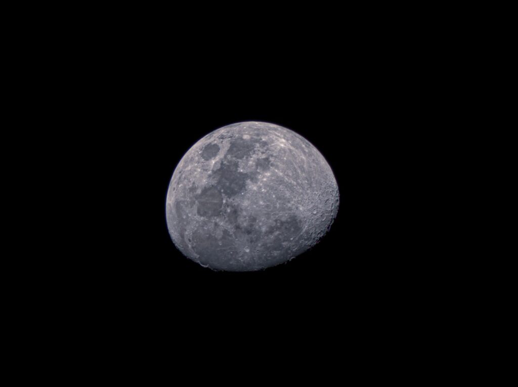 Scenic view of a full moon illuminated in the night sky