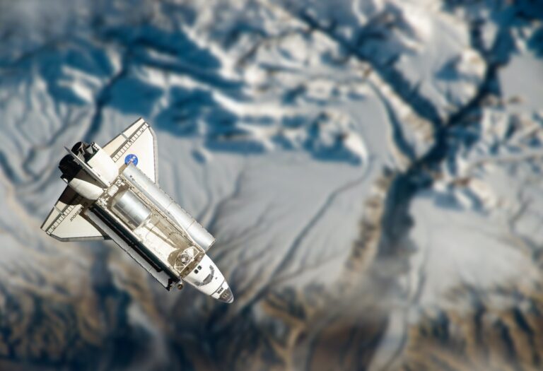 Space Shuttle orbiting the earth. Elements of this image furnished by NASA.