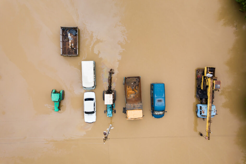 Aerial view of cars flooded with rain water