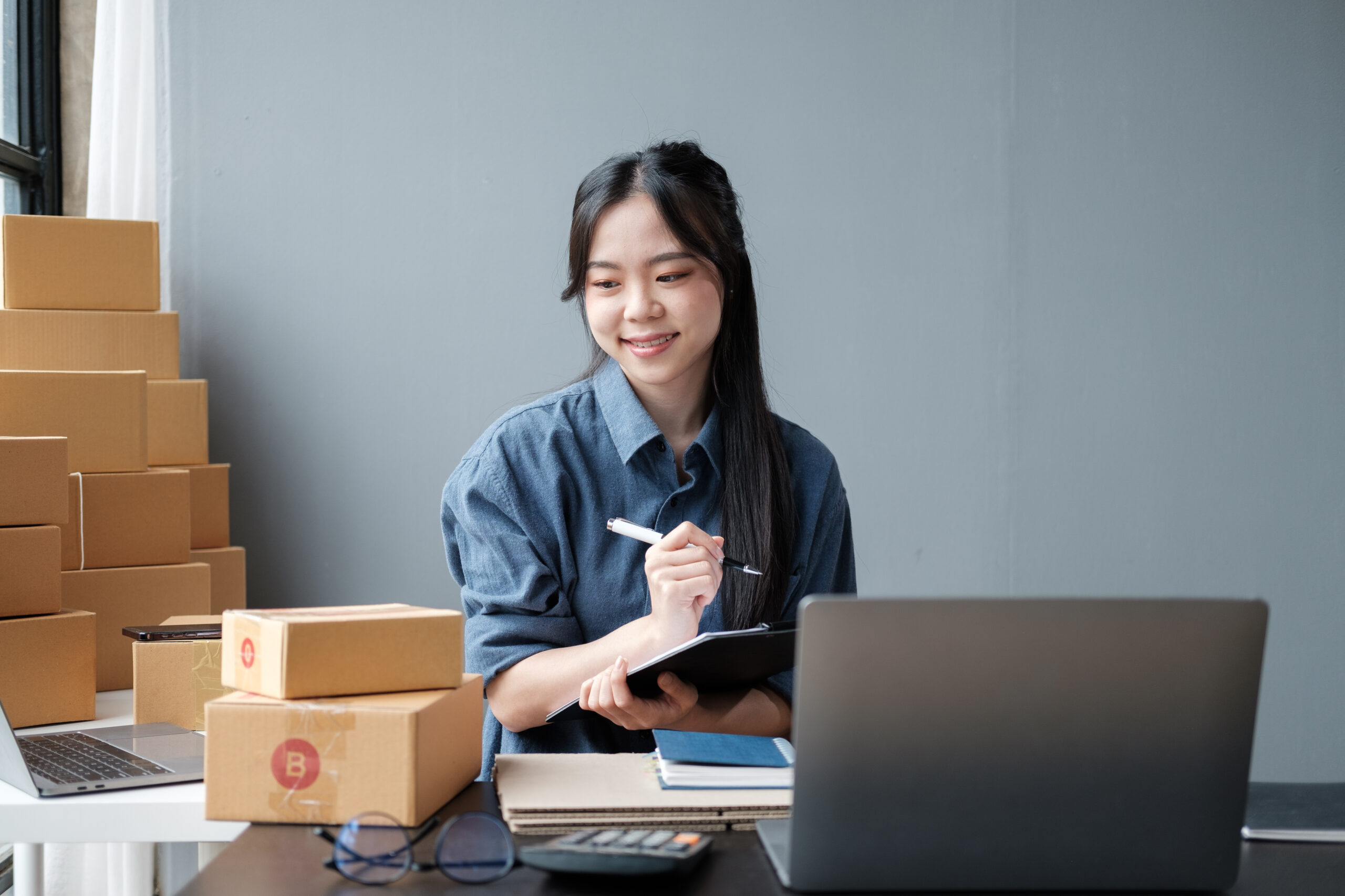 asian small business owner working at home office business retail market and online sell marketing