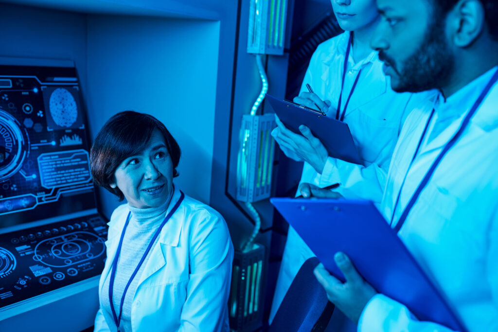 Futuristic Vision: Female Scientist near Computer in Science Center of Tomorrow