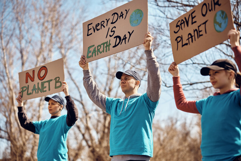 Group of volunteers protest against environmental issues and fighting for preserving planet Earth.