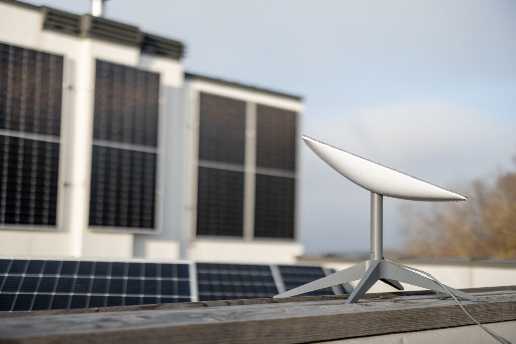 Starlink satellite dish on roof of residential building