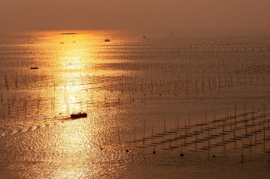 Sunrise on the sea in early morning. The golden rays of the sunrise shone on the sea,Southeast China