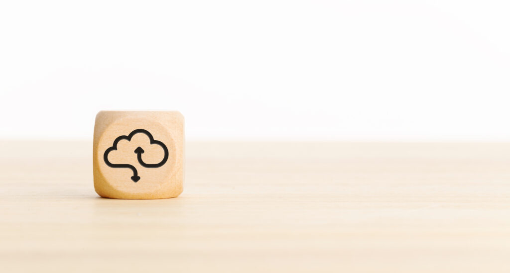 Cloud computing icon on wooden block