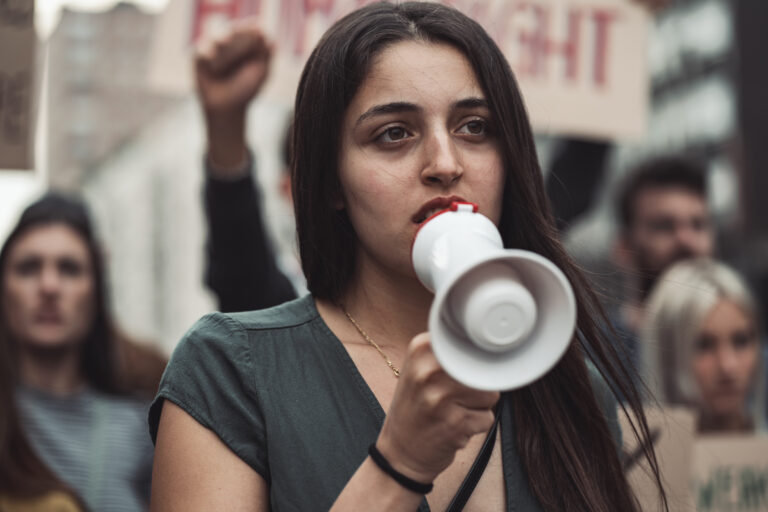 female activist in a protest march