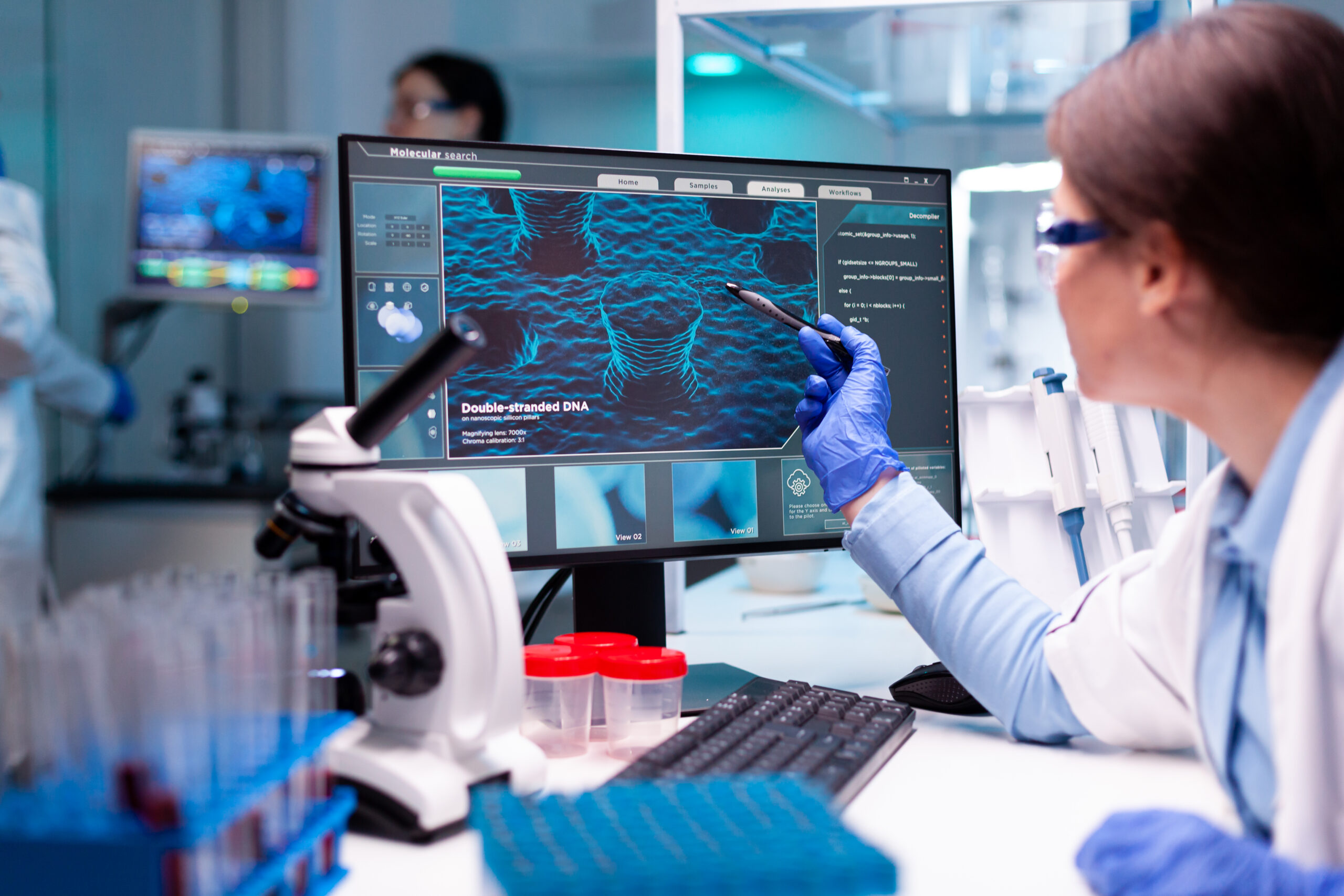 scientist in biochemistry industry healthcare analysing virus