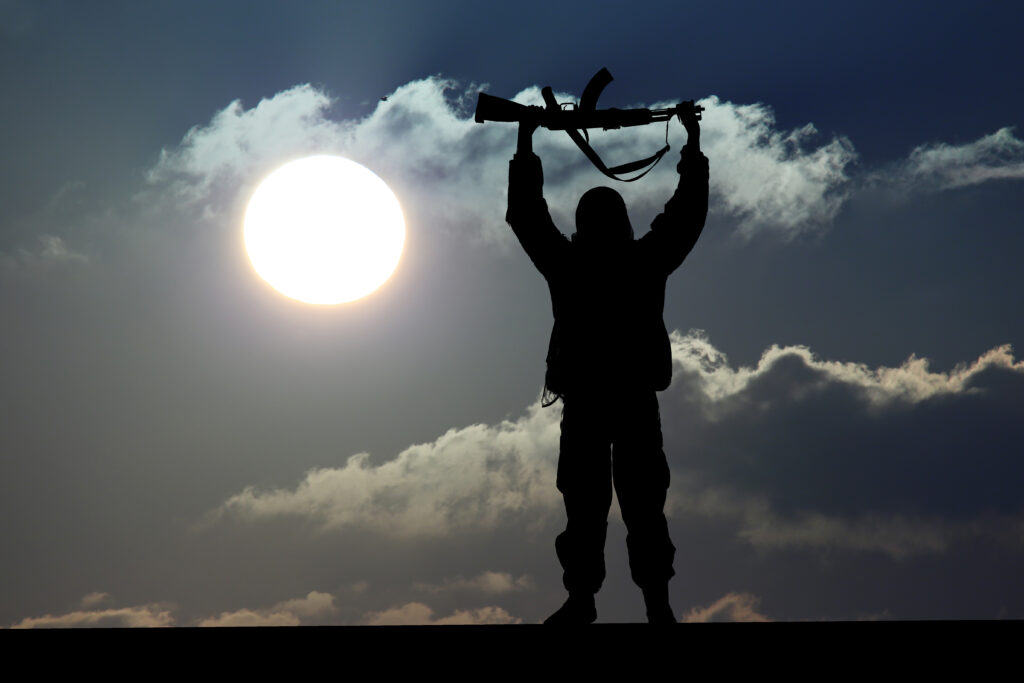 Silhouette of military soldier with weapon