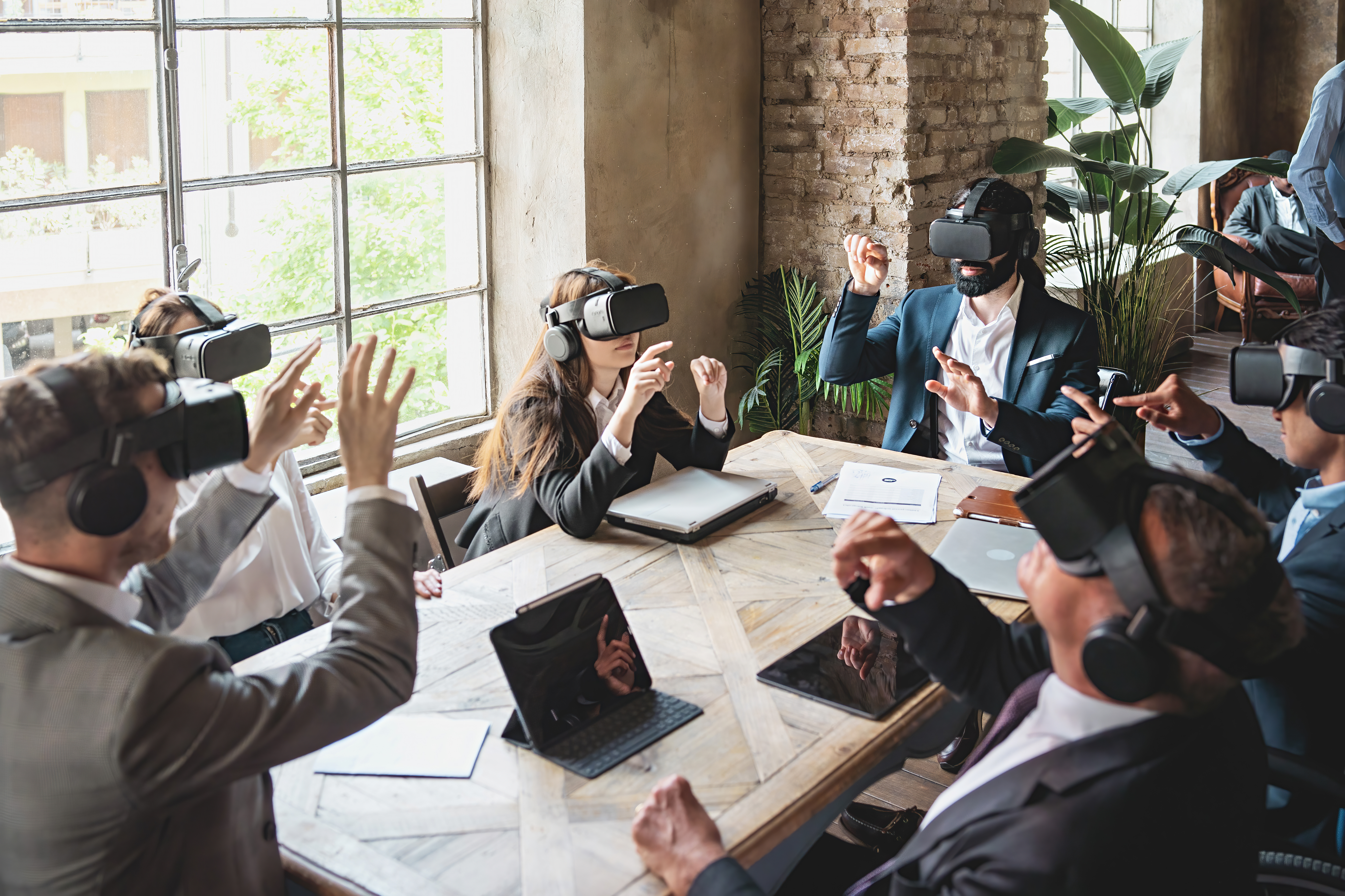 Businesspeople meets in metaverse with VR goggles