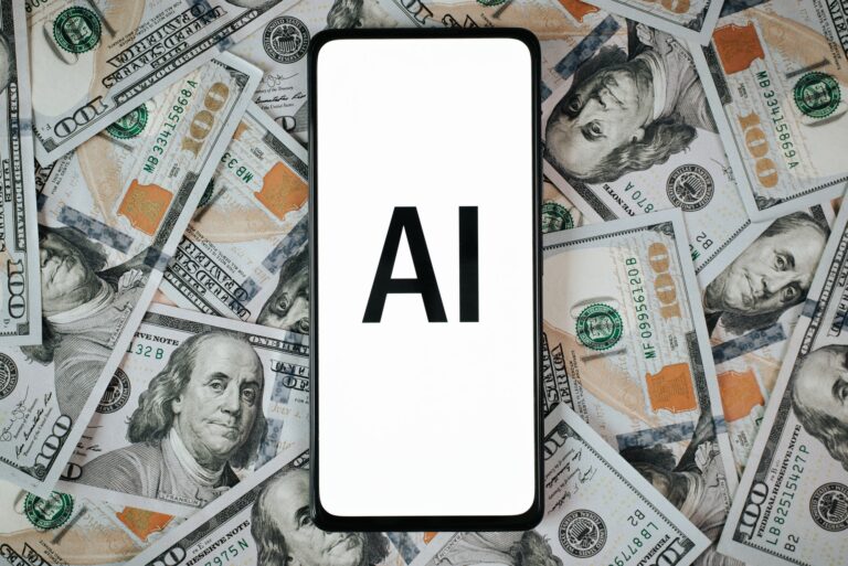 Artificial intelligence and business, profit, investment and finance concept. Top view text AI