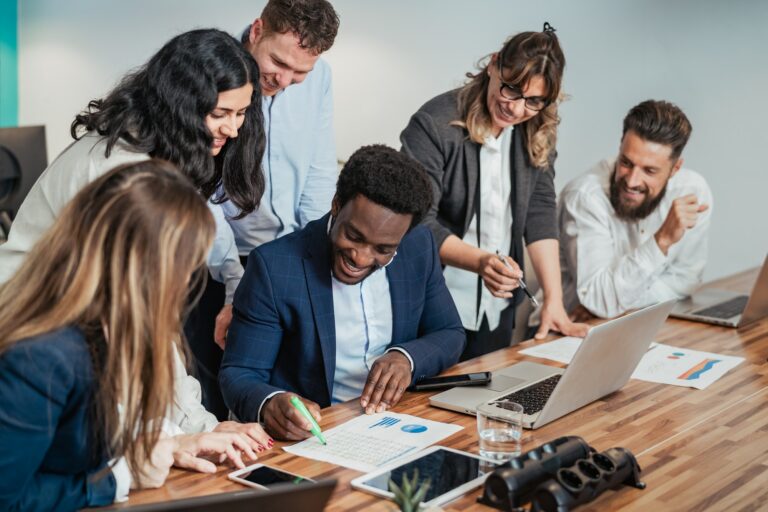 Business team of diverse people doing strategic planning work inside modern office