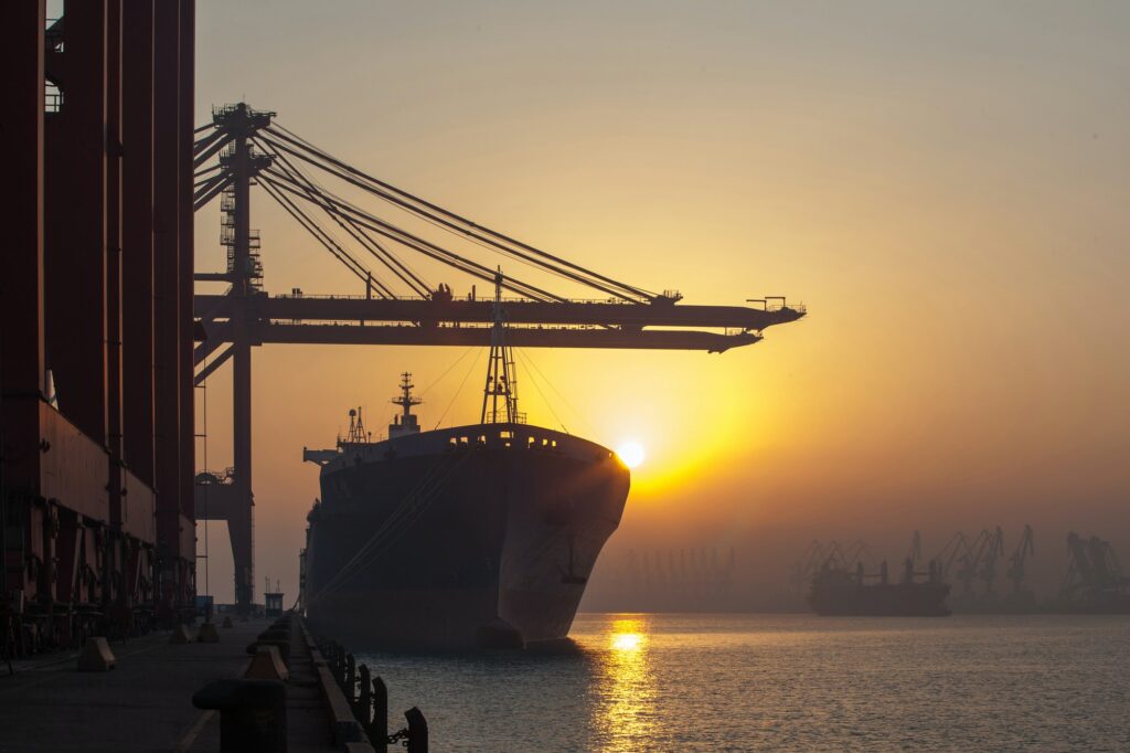 Container ship and cranes at port