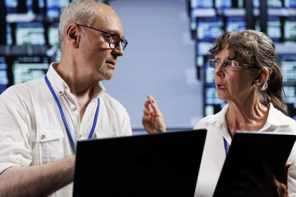 Electricians monitoring supercomputers