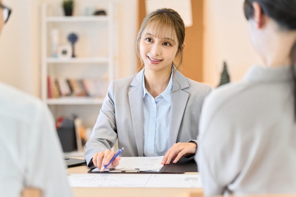 Female salesperson providing real estate information