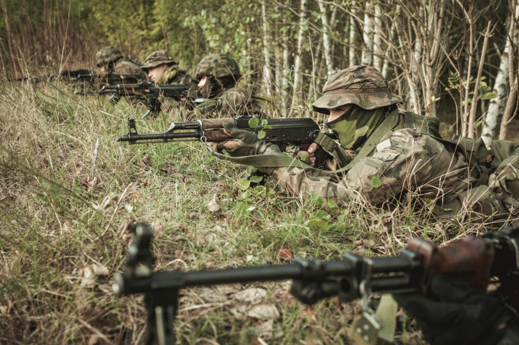 Masked soldiers training military strategy