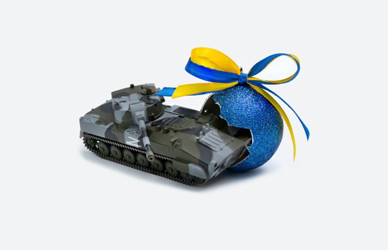 The tank broke the Christmas ball with the symbol of Ukraine.Russian-Ukrainian war