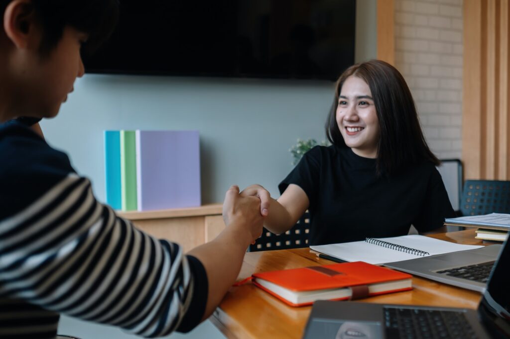 business people handshake for teamwork of business merger and acquisition.