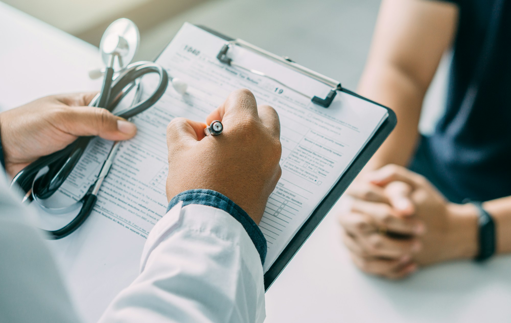 Doctor explaining prescription to patient, Health care and client service in medicine concept.