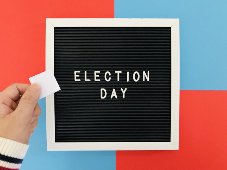 Election Day board on red and blue background