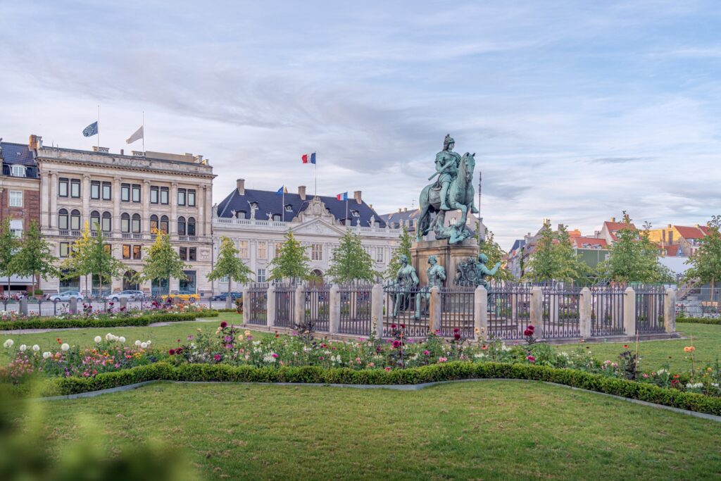 Kongens Nytorv Square with Christian V Statue and Thott Mansion - Copenhagen, Denmark