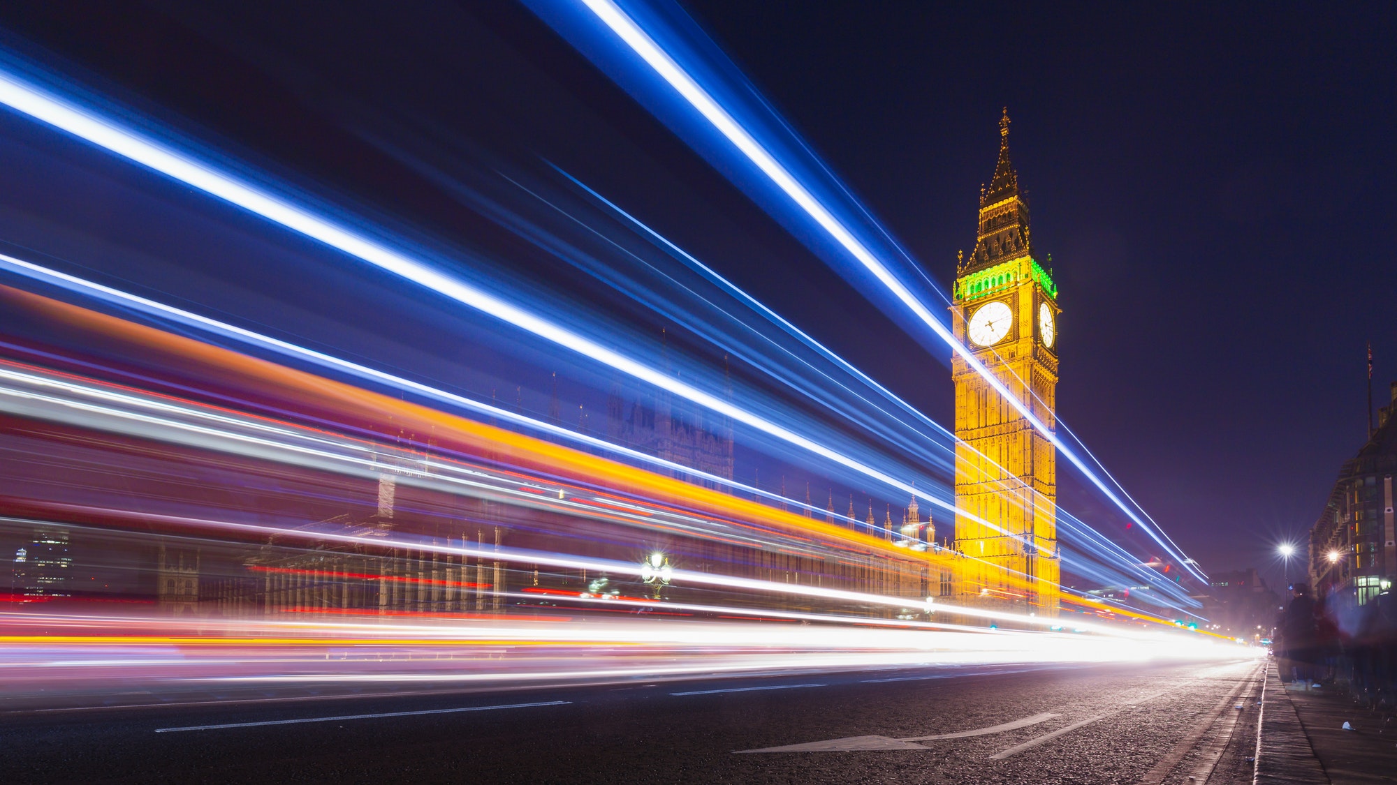 London Big Ben and Parliament with Bus Light Trails at Night, UK