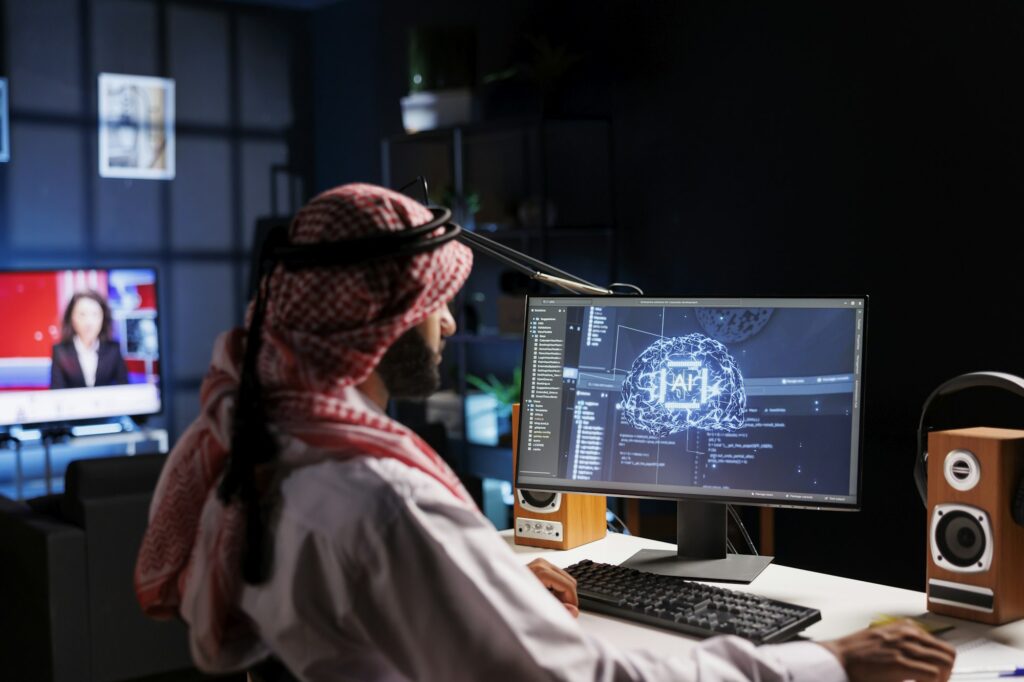 Arab Engineer Monitoring Ai on Screen