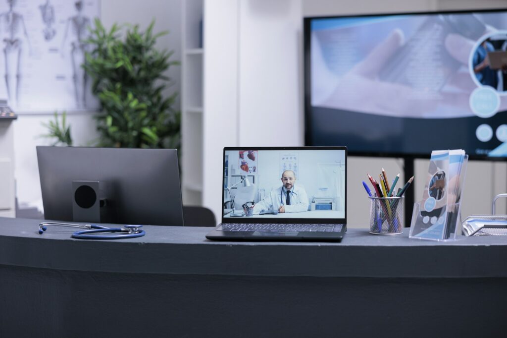 Doctor reporting patients health status in video conference