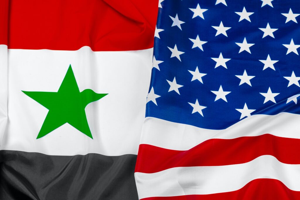 Flag of Syria and flag of United States of America together