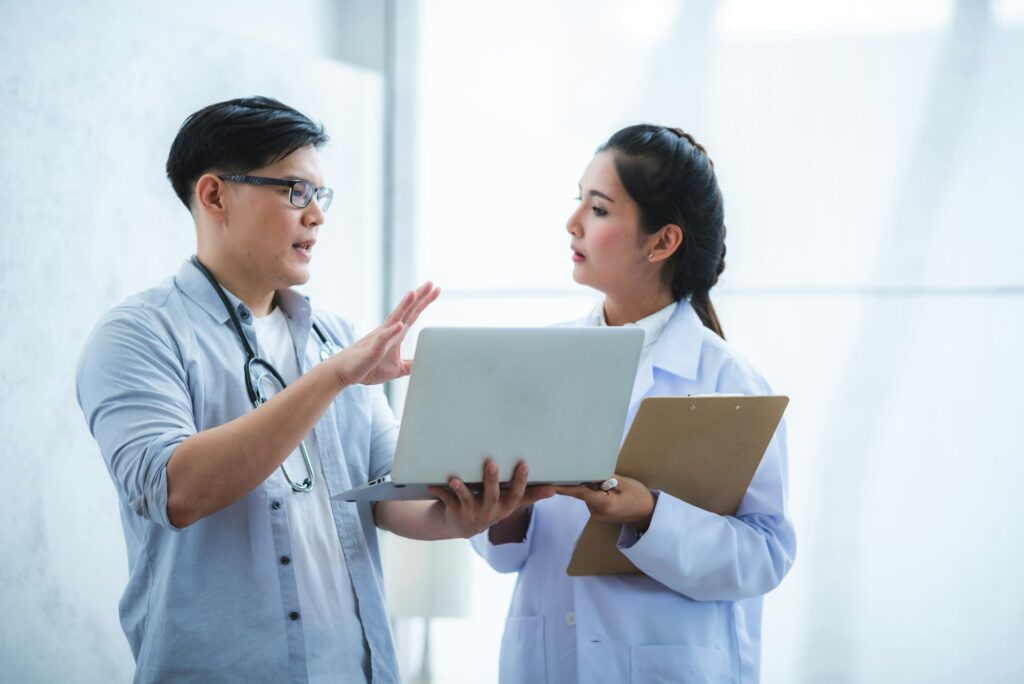 Health care researchers working in medicals science technology research in laboratory