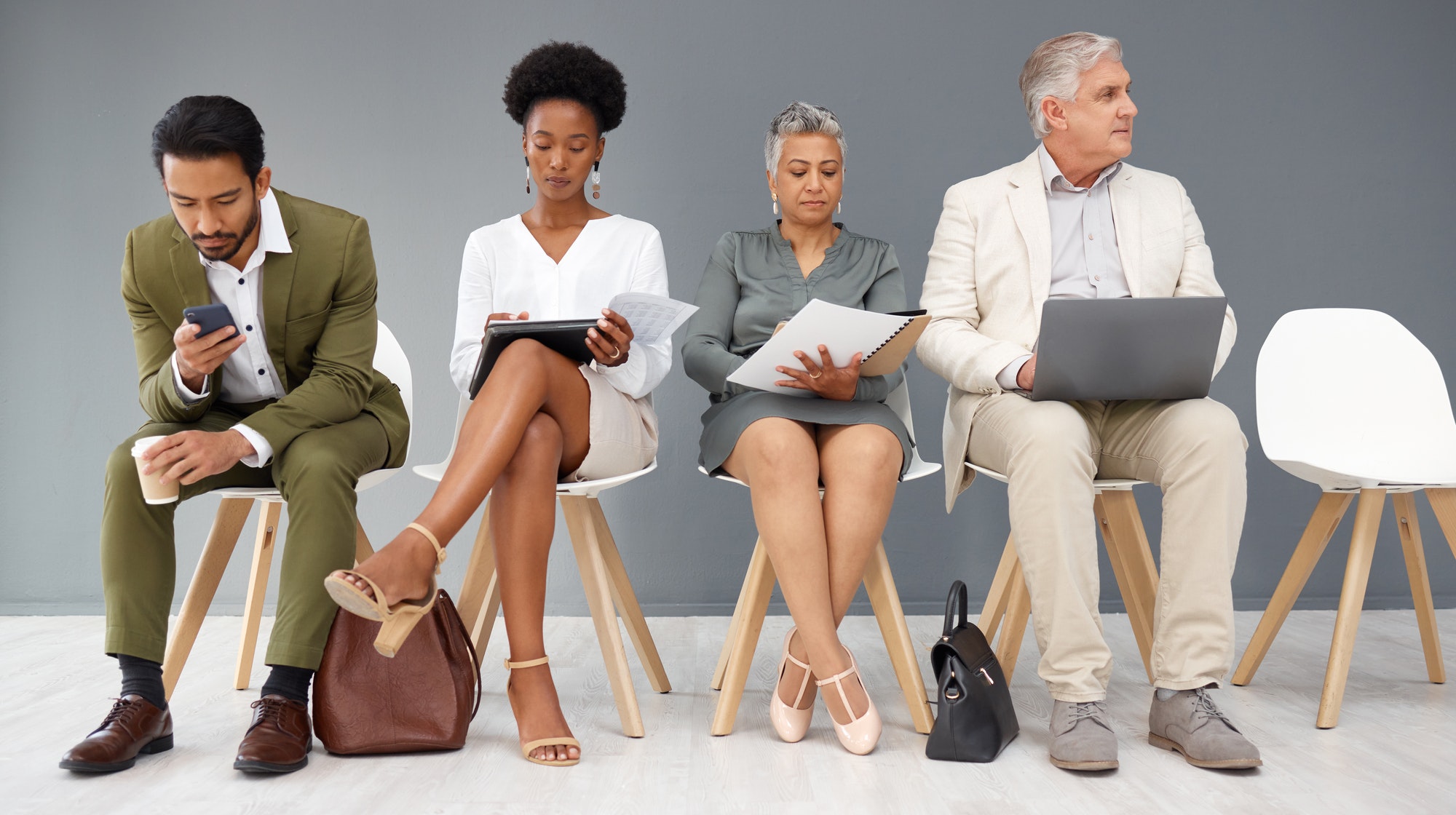 Human resources, technology and business people waiting in line for a recruitment interview. Hiring