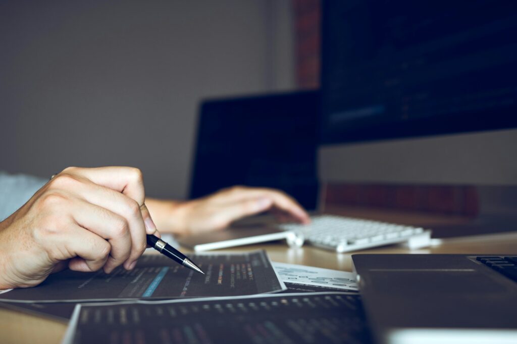 People coding code program programming developer working design software on desk in office.