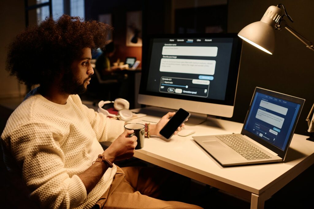 Young AI engineer with cup of coffee