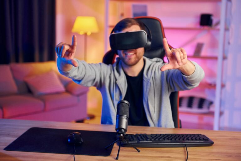 Epic adventure. Portrait of gamer in VR glasses that playing game and streaming it online