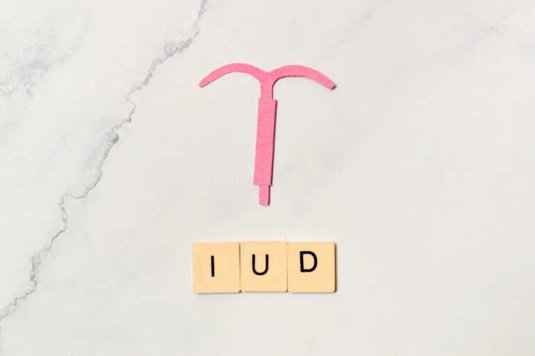 IUD, contraceptive method concept and sex education.