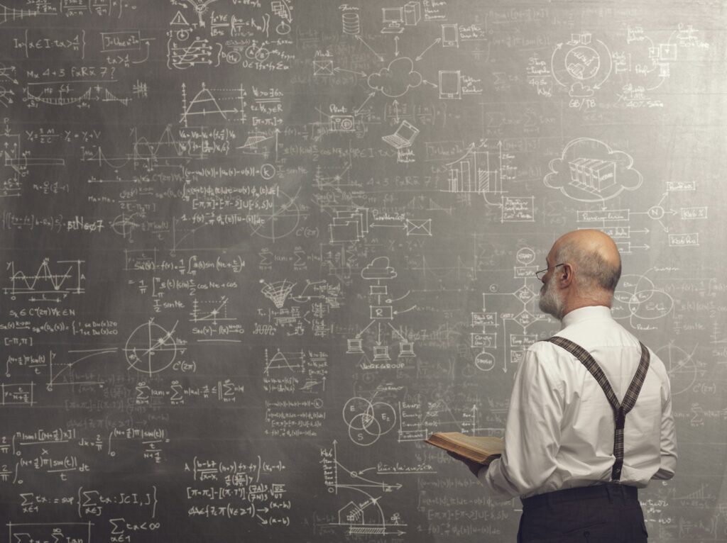 Academic professor teaching and holding a book