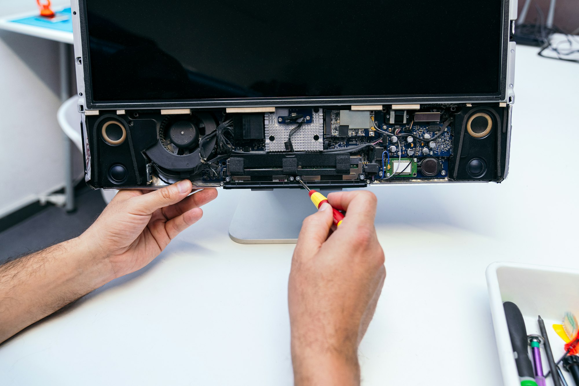 Expert Technician Repairing Inside of a Laptop - Detailed View