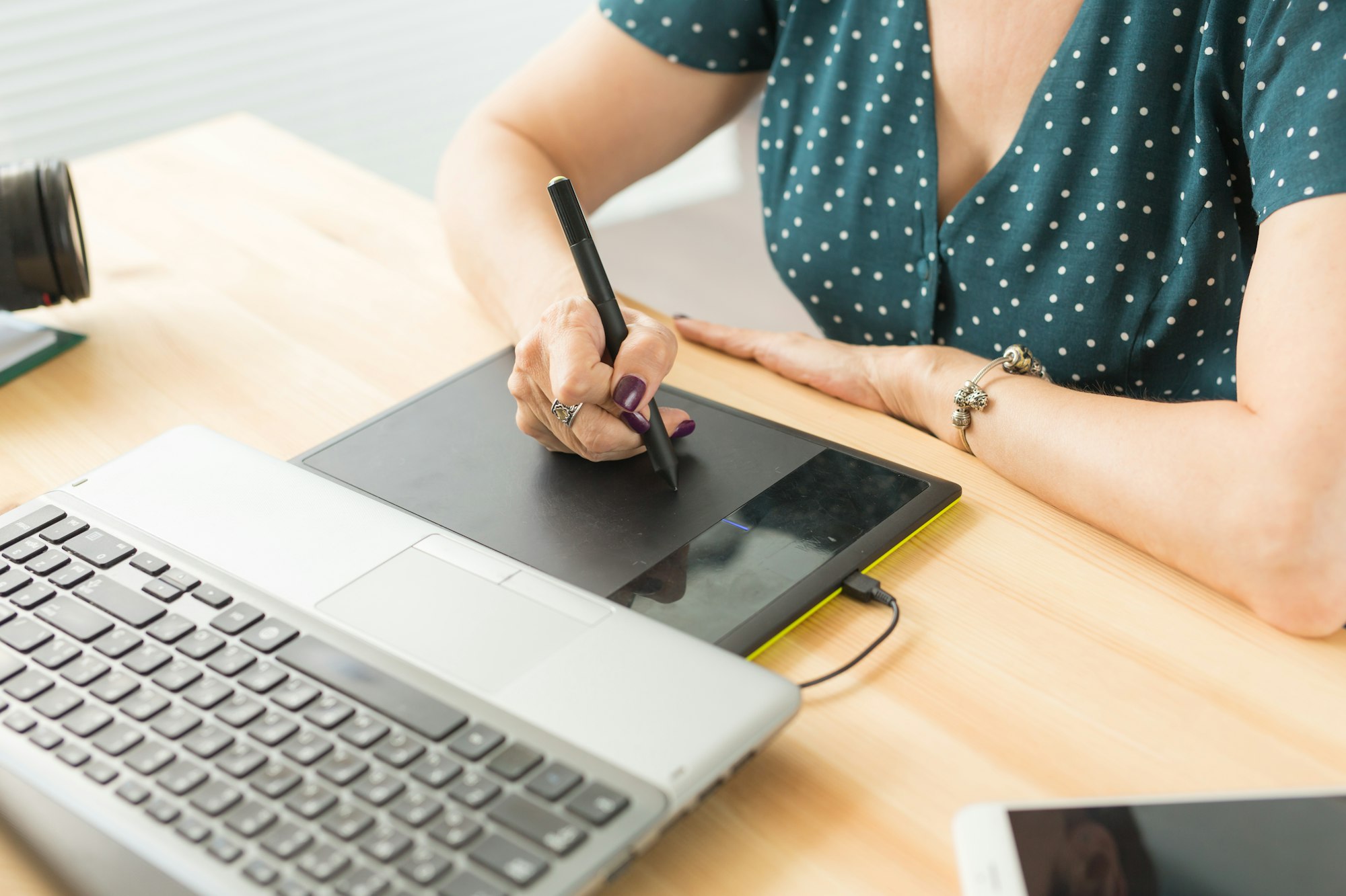 Office, graphic designer concept - Business woman hands holding digital tablet, drawing the sketch