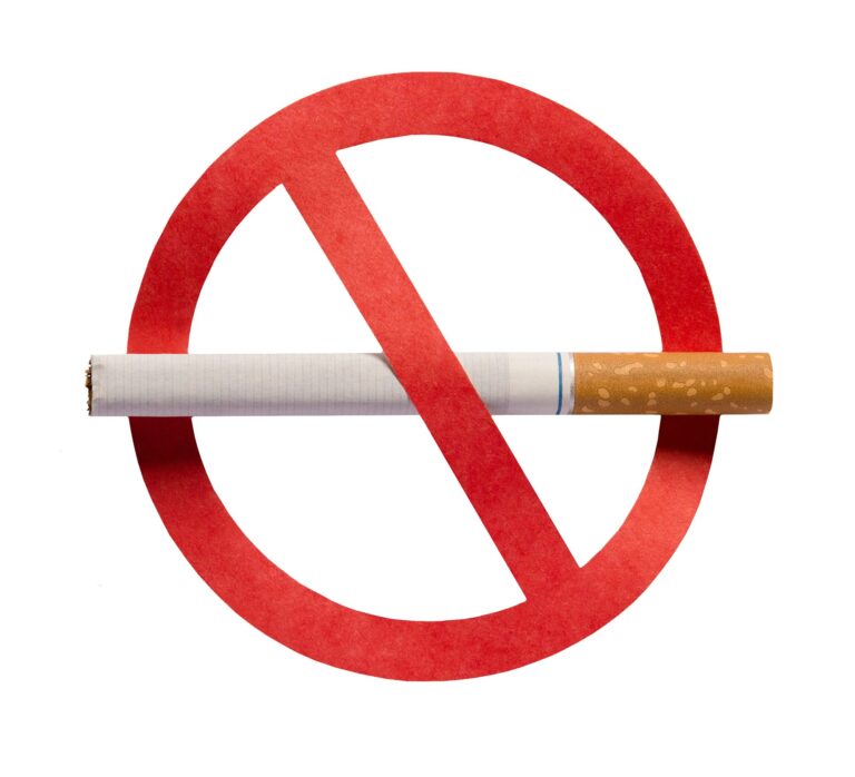 Stop smoking icon. No smoking concept. Red forbidden sign with a cigarette, isolated on a white