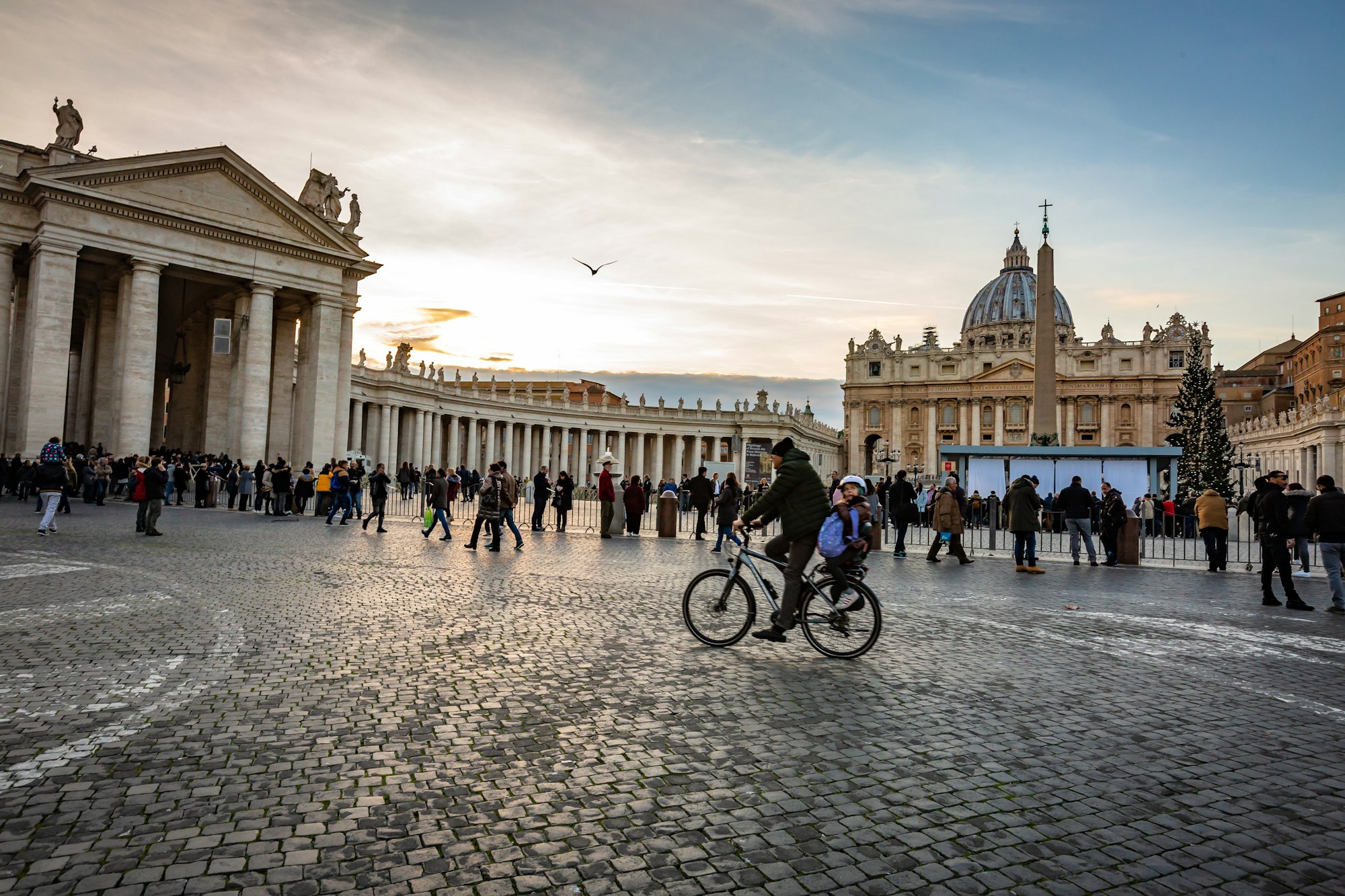 Busy Vatican city at dusk