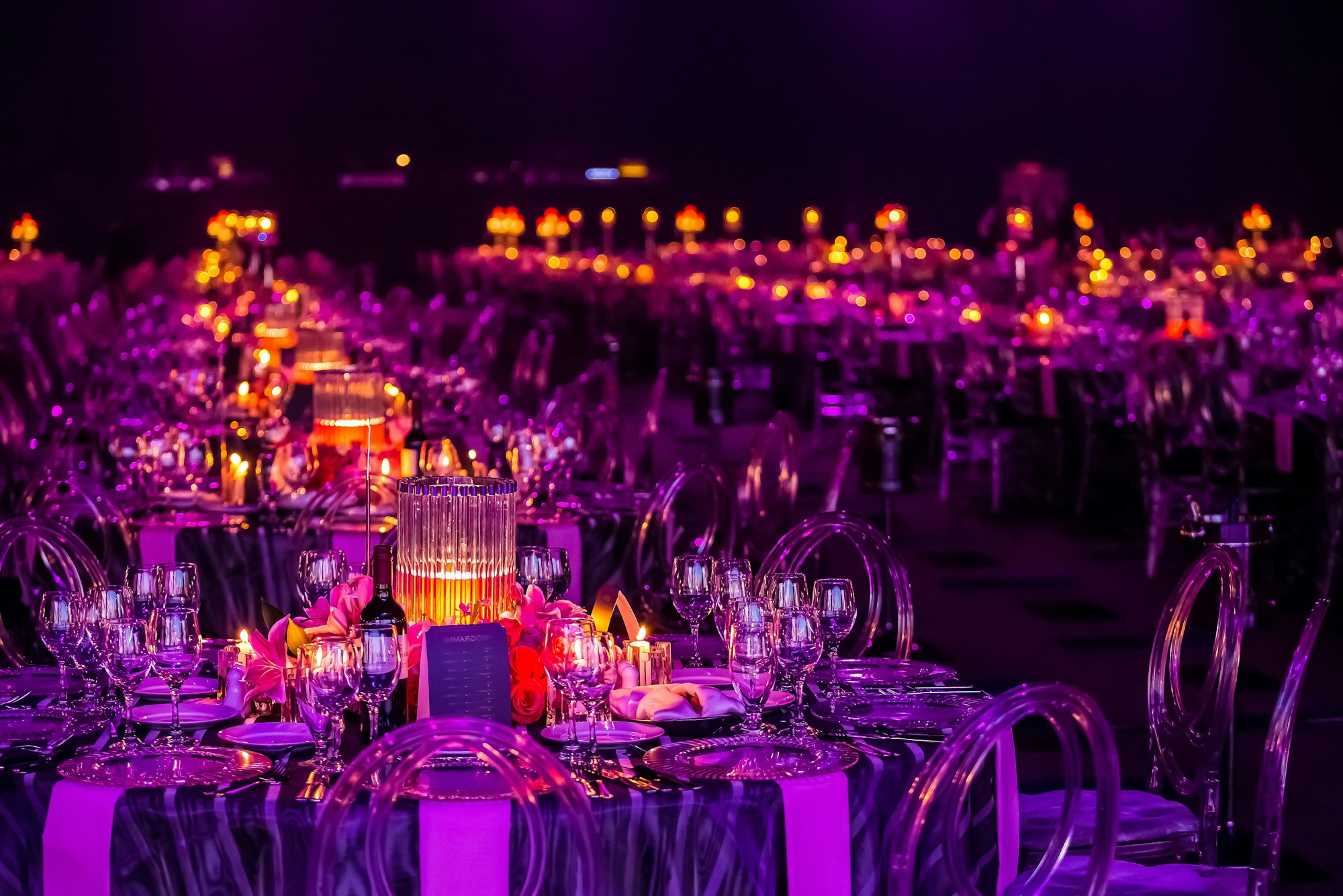 Gala dinner preparation, tables decorated with candles