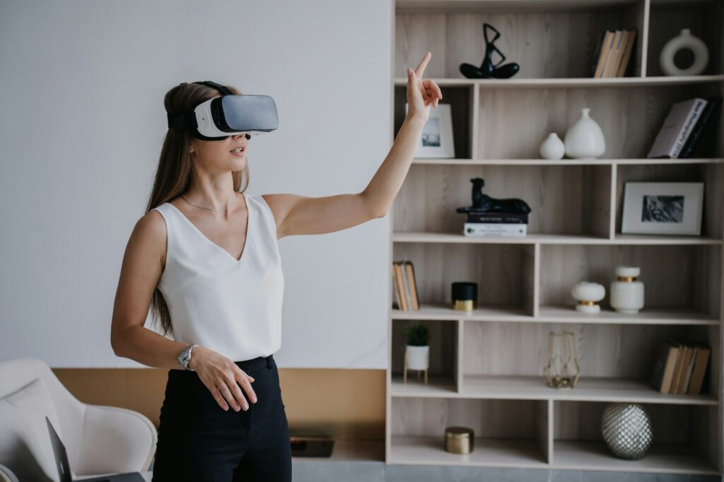 girl using virtual reality headset as an educational tool, hi tech. Pretty young woman in vr glasses