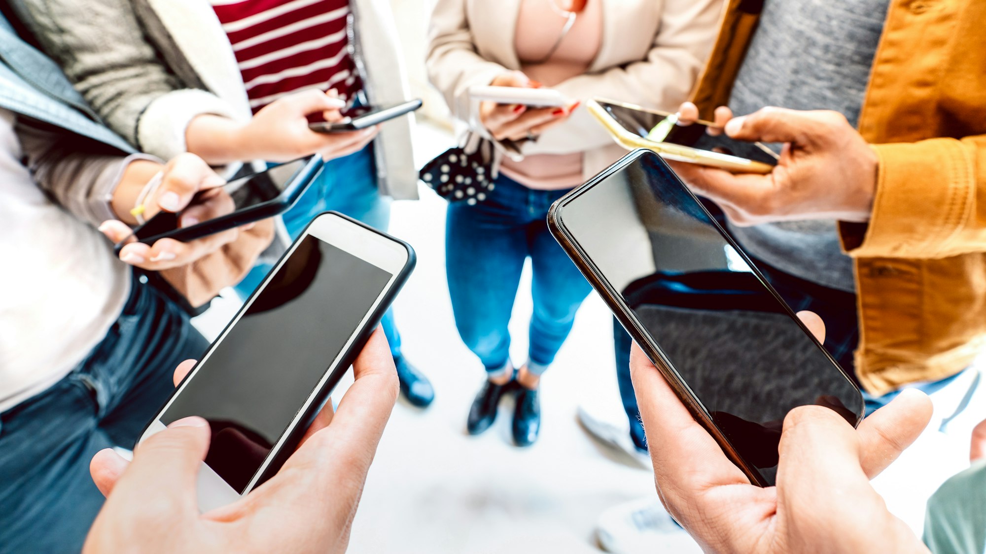 Closeup of people using mobile smart devices